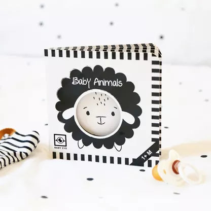 Livre contrasté pour bébé avec ouvertures